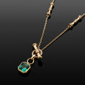 Voluta Chain with Emerald Drop, Contact Us